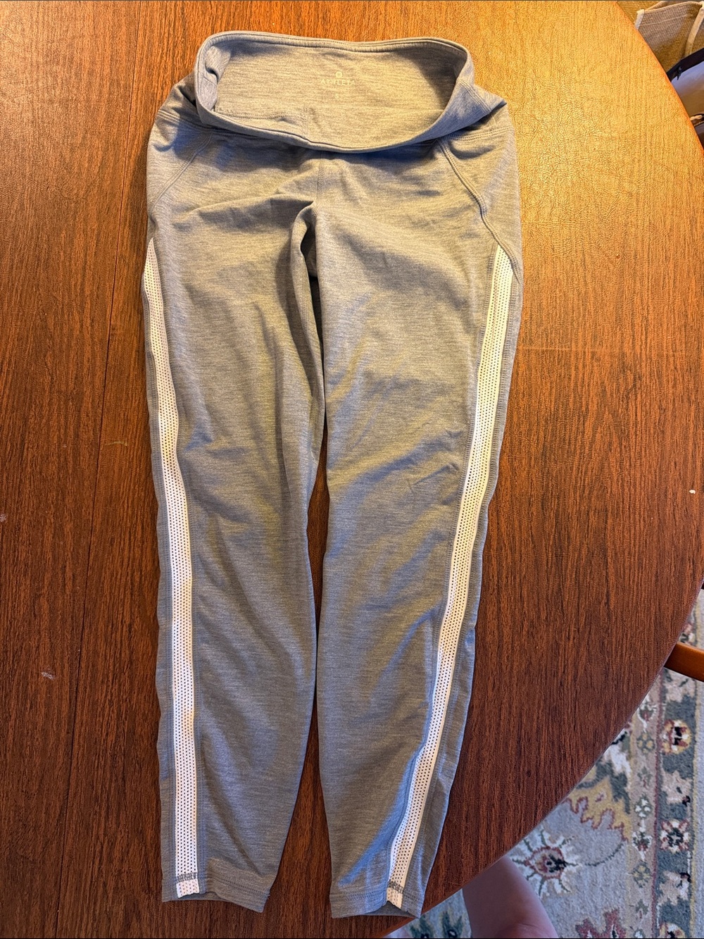 Athleta Cropped Gray Leggings with White Mesh Side Stripes